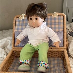 Adorable Brown-Haired Doll with Green Pants